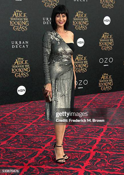 Actress Catherine Bell attends the premiere of Disney's "Alice Through The Looking Glass at the El Capitan Theatre on May 23, 2016 in Hollywood,...