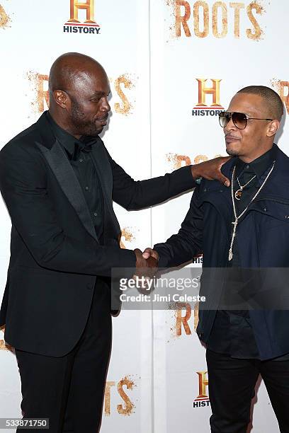 Chris Obi and Tip "T.I." Harris, attend as HISTORY presents night one of the epic event series "Roots" at Alice Tully Hall on May 23, 2016 in New...