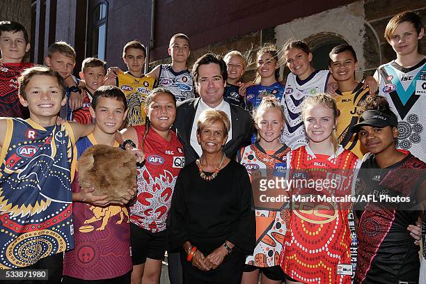Aunty Pam Pedersen, AFL CEO Gillon McLachlan and children wearing Indigenous Round Jerseys pose during the 2016 Toyota AFL Sir Doug Nicholls...