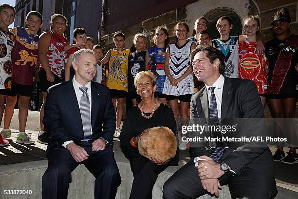 Rio Tinto CEO Andrew Harding, Aunty Pam Pedersen, AFL CEO Gillon McLachlan and children wearing Indigenous Round Jerseys pose during the 2016 Toyota...