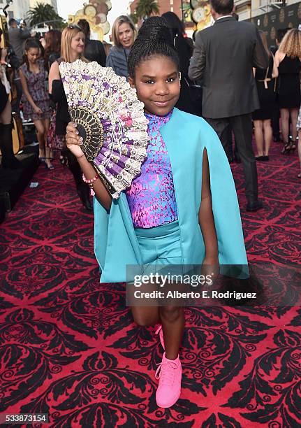 Actress Trinitee Stokes attends Disneys 'Alice Through the Looking Glass' premiere with the cast of the film, which included Johnny Depp, Anne...