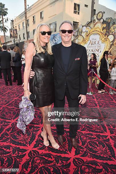 Margaret DeVogelaere and actor Peter Fonda attend Disneys 'Alice Through the Looking Glass' premiere with the cast of the film, which included...