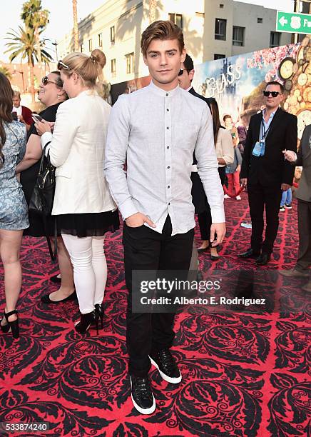 Actor Garrett Clayton attends Disneys 'Alice Through the Looking Glass' premiere with the cast of the film, which included Johnny Depp, Anne...