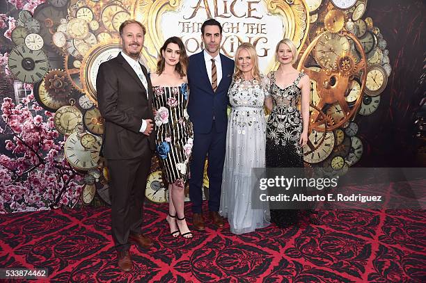 Director James Bobin, actress Anne Hathaway, actor Sacha Baron Cohen, producer Suzanne Todd and actress Mia Wasikowska attend Disneys 'Alice Through...