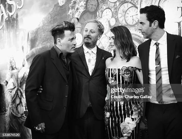 Actor Johnny Depp, director James Bobin, actress Anne Hathaway and actor Sacha Baron Cohen attend Disneys 'Alice Through the Looking Glass' premiere...