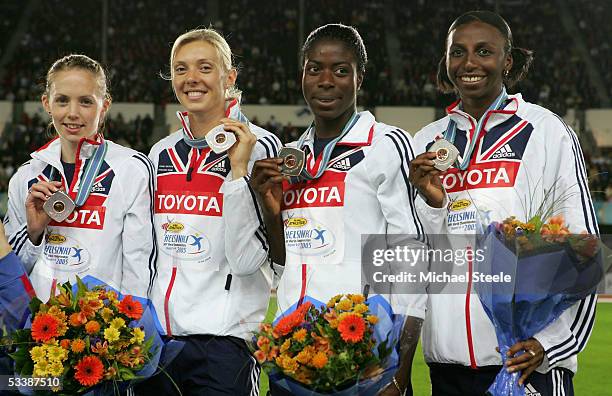 Nicola Sanders, Lee McConnell, Christine Ohuruogu and Donna Fraser of the Great Britain?s relay team pose for a picture during the medal ceremony for...