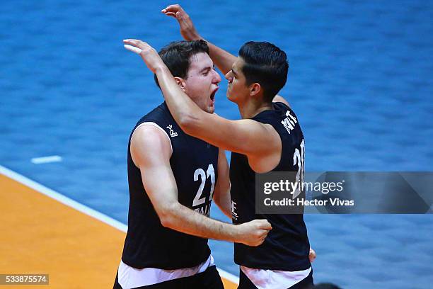 Jose Martinez and Julian Duarte of Mexico celebrate during a match between Mexico and Argentina as part of Men's Panamerican Volleyball Cup at...