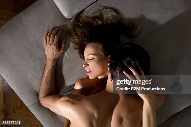 young couple engaged in sexual intercourse - copulating stock pictures, royalty-free photos & images