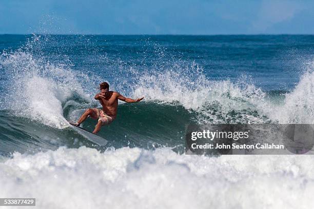 surfing in the turtle islands - sierra leone stock pictures, royalty-free photos & images