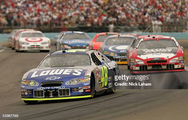 Jimmie Johnson driver of the Lowe's Chevrolet leads a pack of cars during the NASCAR Nextel Cup Series Sirius Satellite Radio at the Glen on August...