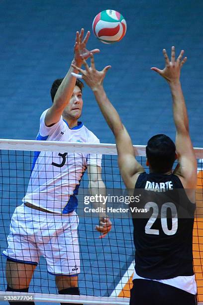 Franchi Martinez of Argentina spikes the ball against Julian Duarte of Mexico during a match between Mexico and Argentina as part of Men's...
