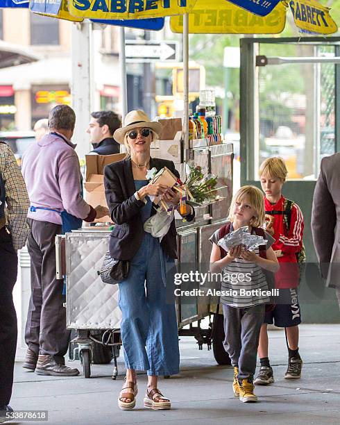 Naomi Watts is seen buying pretzels for her sons, Samuel Schreiber and Alexander Schreiber in TriBeCa on May 23, 2016 in New York City.