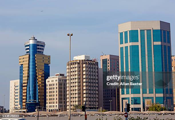diplomatic quarter of manama at dusk - bahrain tourism stock pictures, royalty-free photos & images