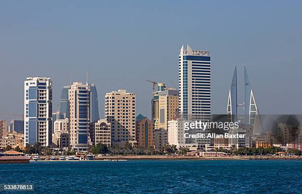 modern cityscape over manama - bahrain skyline stock pictures, royalty-free photos & images