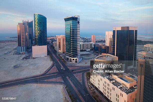 elevated cityscape of manama's seef district - bahrain stock-fotos und bilder