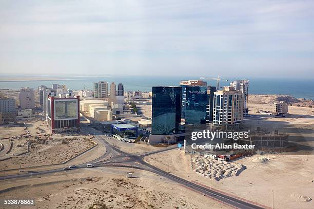 elevated view of manama's seef district - manama stock-fotos und bilder