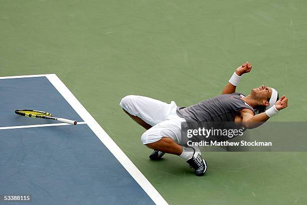 Rafael Nadal of Spain celebrates match point against Andre Agassi of the United States during the final of the Rogers Cup on August 14, 2005 at...