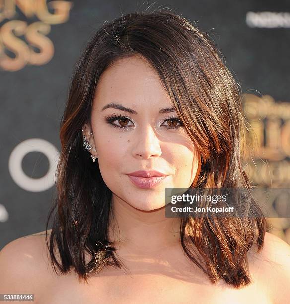 Actress Janel Parrish arrives at the Los Angeles Premiere "Alice Through The Looking Glass" at the El Capitan Theatre on May 23, 2016 in Hollywood,...