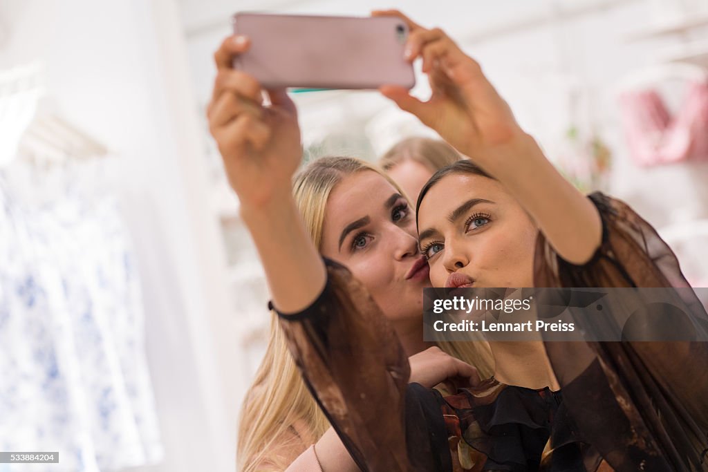 Irina Shayk takes a selfie picture with a fan during the presentation  News Photo - Getty Images