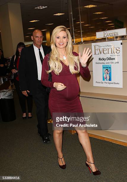 Reality TV Personality Holly Madison signs copies of her new book "The Vegas Diaries: Romance, Rolling The Dice, And The Road To Reinvention" at The...