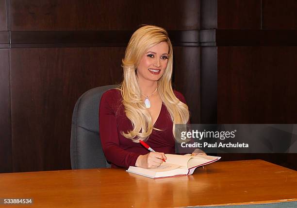 Reality TV Personality Holly Madison signs copies of her new book "The Vegas Diaries: Romance, Rolling The Dice, And The Road To Reinvention" at The...