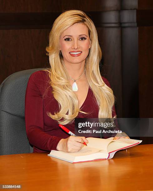 Reality TV Personality Holly Madison signs copies of her new book "The Vegas Diaries: Romance, Rolling The Dice, And The Road To Reinvention" at The...