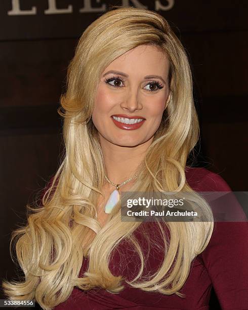 Reality TV Personality Holly Madison signs copies of her new book "The Vegas Diaries: Romance, Rolling The Dice, And The Road To Reinvention" at The...