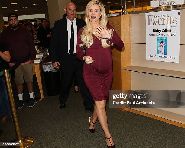 Reality TV Personality Holly Madison signs copies of her new book "The Vegas Diaries: Romance, Rolling The Dice, And The Road To Reinvention" at The...