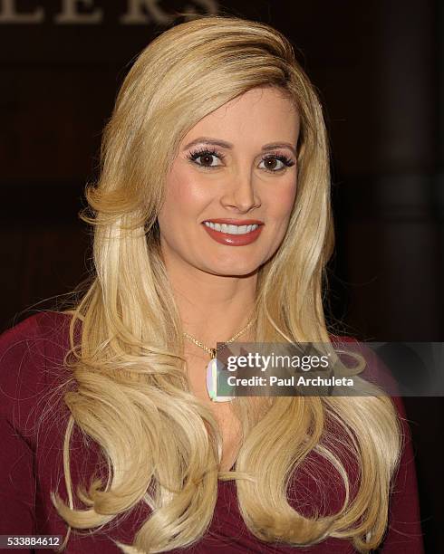 Reality TV Personality Holly Madison signs copies of her new book "The Vegas Diaries: Romance, Rolling The Dice, And The Road To Reinvention" at The...