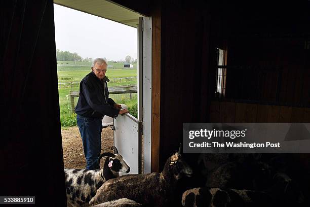 Fred Horak works on feeding and watering some of his Jacob sheep at his property on Wednesday May 11, 2016 in Gettysburg, PA. Ever since he and his...