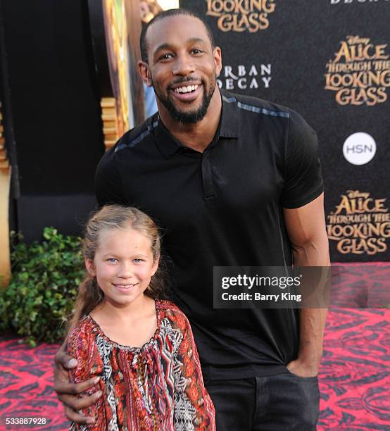 Personality/dancer Stephen 'tWitch' Boss and daughter Weslie Fowler attend the premiere of Disney's' 'Alice Through The Looking Glass' at the El...