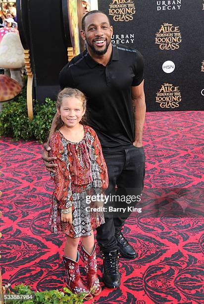 Personality/dancer Stephen 'tWitch' Boss and daughter Weslie Fowler attend the premiere of Disney's' 'Alice Through The Looking Glass' at the El...