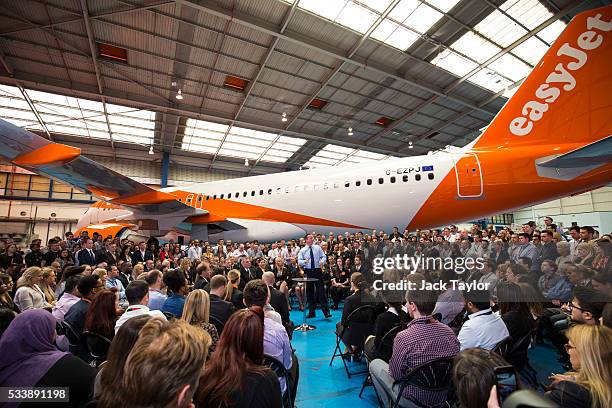 British Prime Minister David Cameron delivers a speech to easyJet employees at the aviation company's Luton Airport Hangar on May 24, 2016 in Luton,...