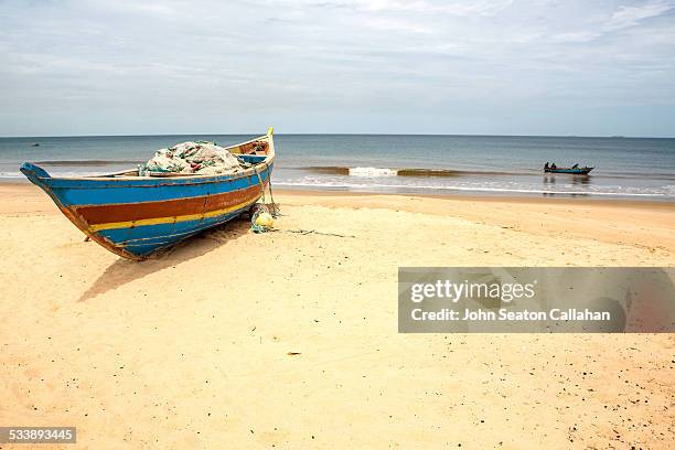 fishing boat - sierra leone beach stock pictures, royalty-free photos & images