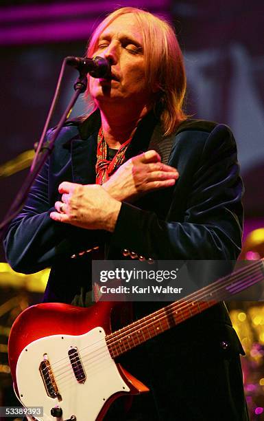 Tom Petty and his band the Heartbreakers perform at the Verizon Wireless Amphitheatre on August 14, 2005 in Irvine, California.