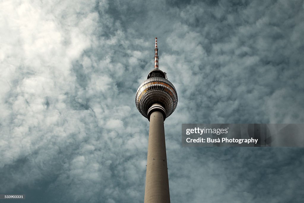 Berlin's TV Tower against a cloudy sky
