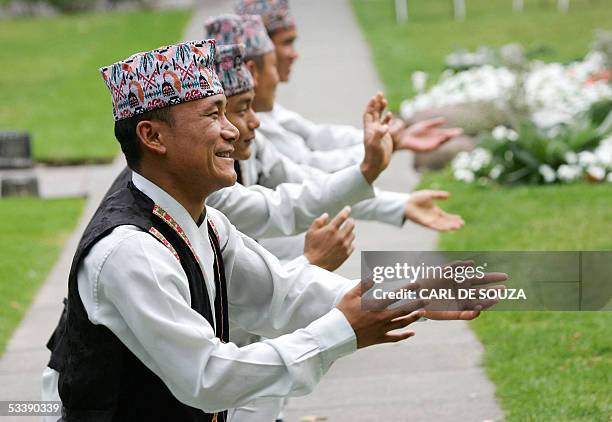 London, UNITED KINGDOM: Burmese dancers perform during a ceremony to mark the sixtieth anniversary of Victory over Japan Day and honour the men and...