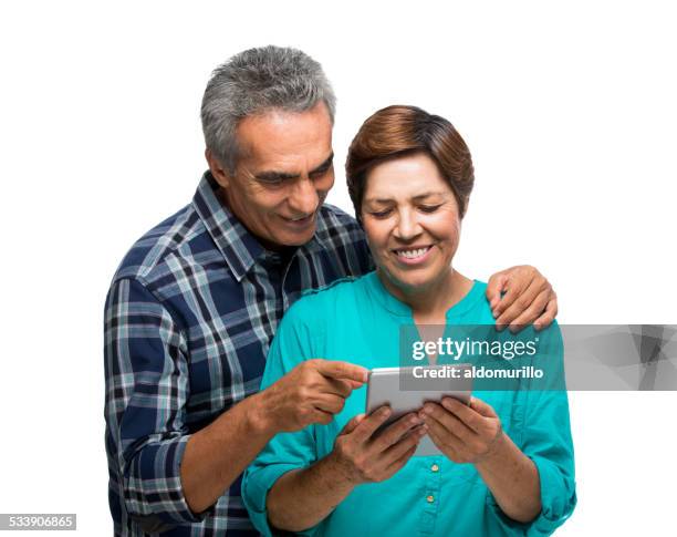 happy senior couple using digital tablet - man ipad isolated stock pictures, royalty-free photos & images