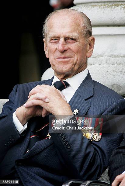 The Duke of Edinburgh watches the Gurka band march past as World War II veterans gather to commemorate the 60th anniversary of VJ Day which marked...