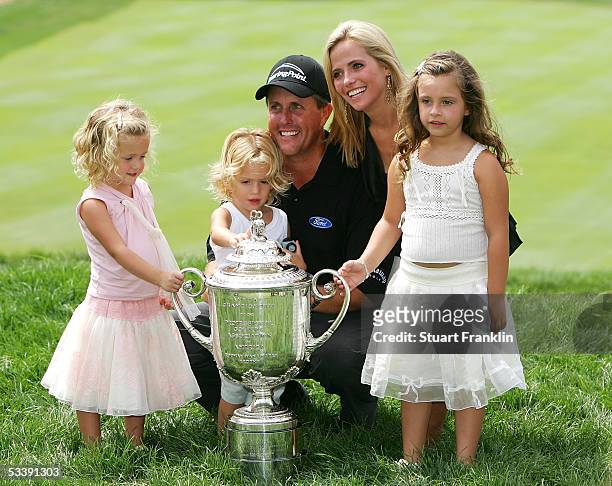 Phil Mickelson is surrounded by his wife, Amy , daughters Sophia , Evan and Amanda after winning the 2005 PGA Championship with a 4-under par 276 on...