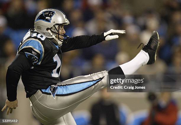 Punter Todd Sauerbrun of the Carolina Panthers kicks the ball against the St. Louis Rams during the game at Bank of America Stadium on December 12,...