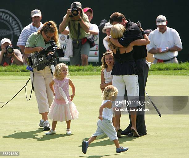 Phil Mickelson is congratulated by his wife, Amy, his daughters Sophia , Evan and Amanda after winning the 2005 PGA Championship with a 4-under par...