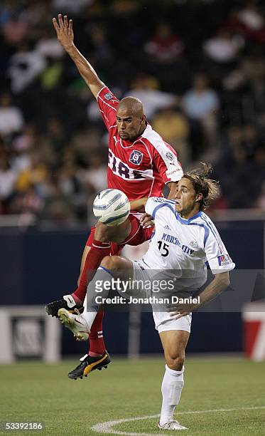 Brown of the Chicago Fire and Josh Wolff of the Kansas City Wizards vie for the ball during their MLS match on August 10, 2005 at Soldier Field in...