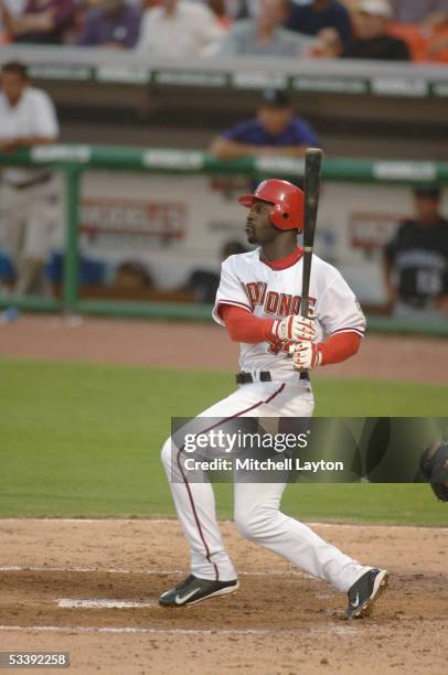 Preston Wilson of the Washington Nationals takes a swing in a game against the Colorado Rockies on July 18, 2005 at RFK Stadium in Washington D.C....