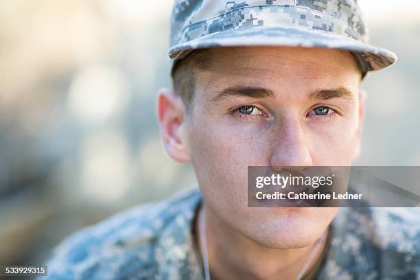 army man srutinizing the camera - military recruit stock pictures, royalty-free photos & images