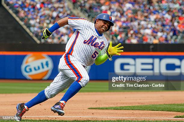 May 22: Yoenis Cespedes of the New York Mets rounds third base to score on a Asdrubal Cabrera single in the fourth inning which also scored Michael...