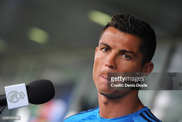 Cristiano Ronaldo of Real Madrid talks to members of the press at the mixed zone after the team training session at the Real Madrid Open Media Day...