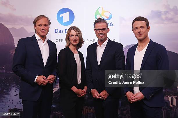 Moderator Gerhard Delling , ARD moderator Alexander Bommes , ARD moderator Jessy Wellmer and ARD moderator Michael Antwerpes pose during a photocall...
