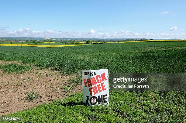 An anti fracking sign is placed overlooking the open countryside of Ryedale near the village of Kirby Misperton on May 24, 2016 in Malton, England....