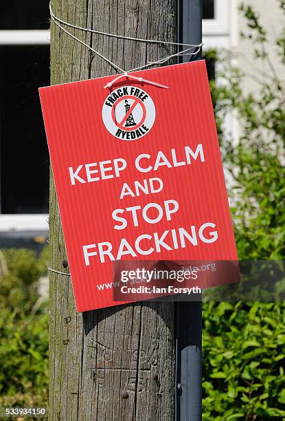 Anti fracking placards and signs are displayed in the village of Kirby Misperton on May 24, 2016 in Malton, England. North Yorkshire Planning and...